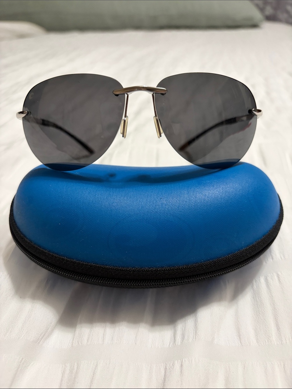 Costa Del Mar Rimless Aviator Sunglasses with Dark Gray Lenses